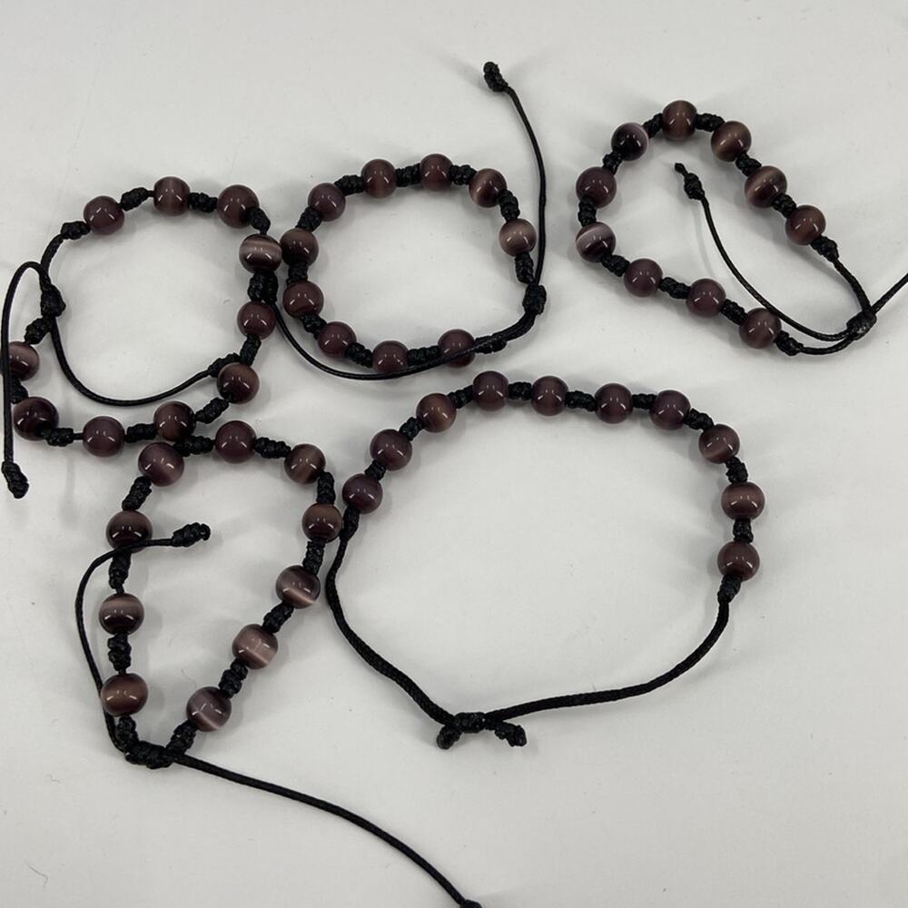 5 purple beaded bracelets